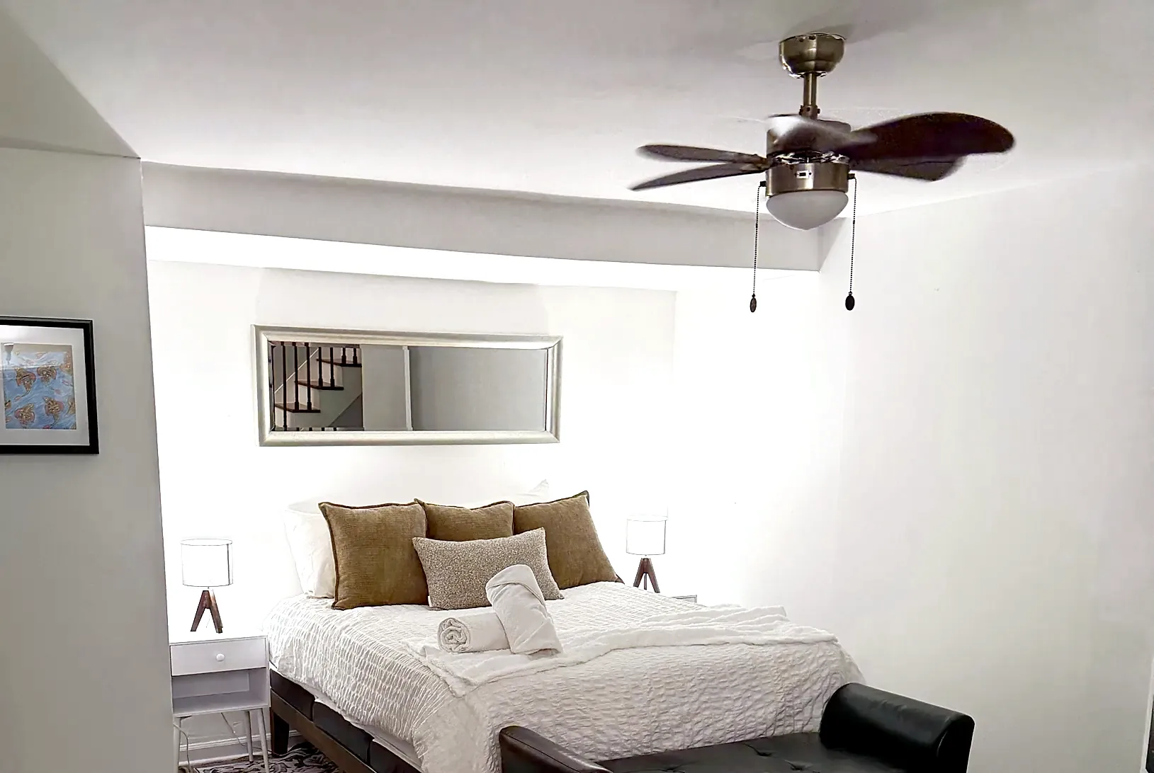 Main bedroom in 2026: new bed, neutral pillows, bright white walls