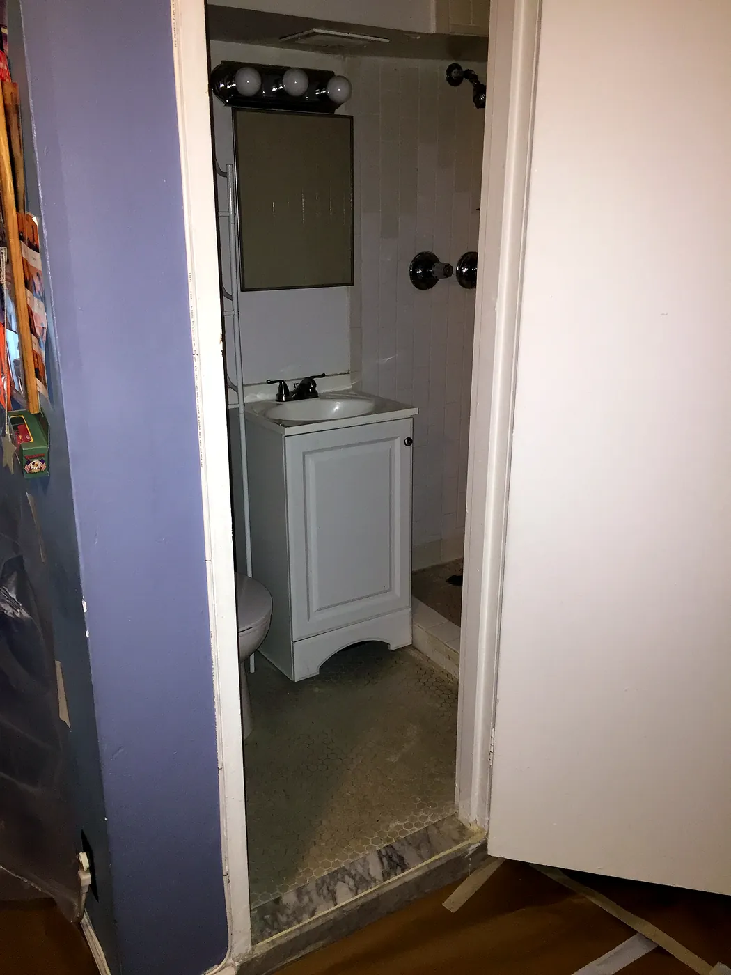 Downstairs bath in December 2015: white subway tile, hex floor